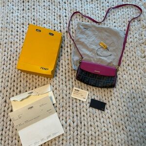 Authentic FENDI 2015 Zucca Pink cyclamin & Tobacco
Mini Pouch wt box and tags